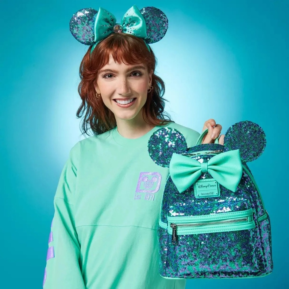 Loungefly Disney Parks purple and teal Minnie bag